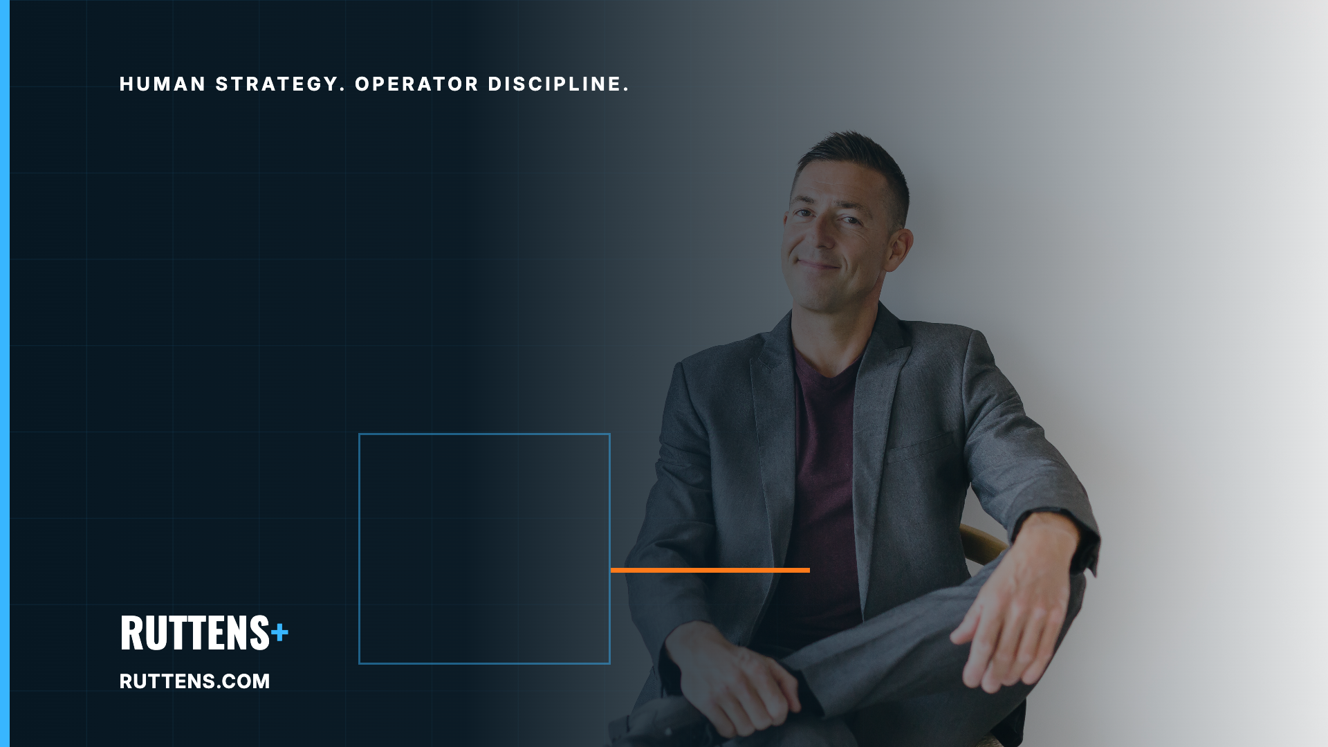 Phil Ruttens seated in a relaxed business portrait against a dark blue editorial system background
